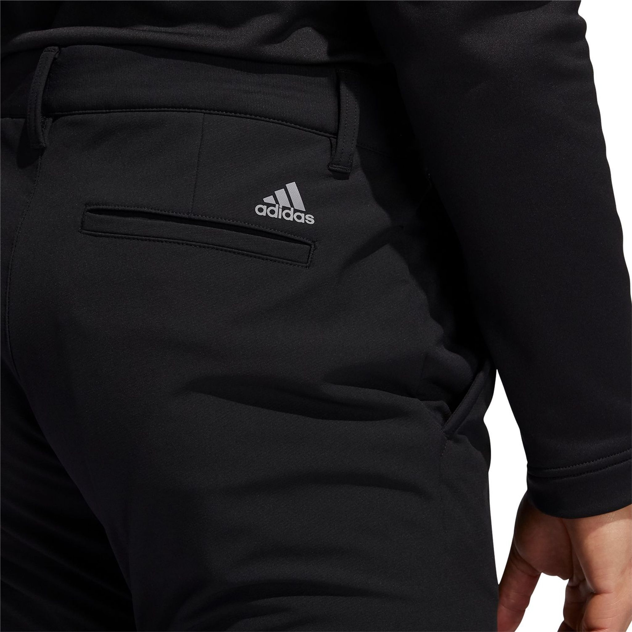 Pantalon de golf isolé Adidas Frost Guard pour hommes